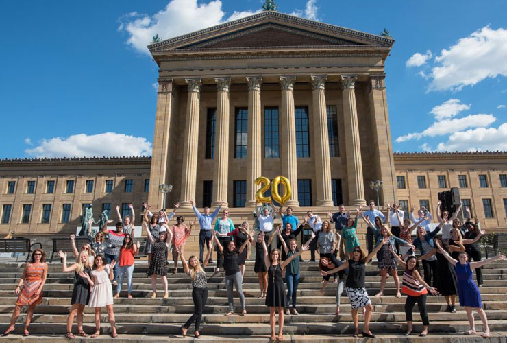 Exude employees standing at the Philadelphia Art Museum