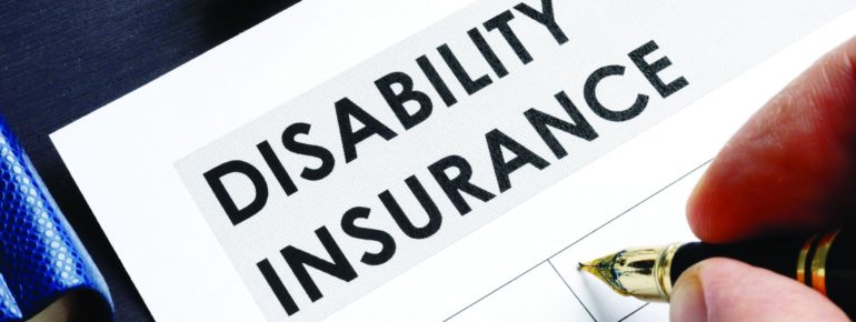 image: Person filling out Disability Insurance form